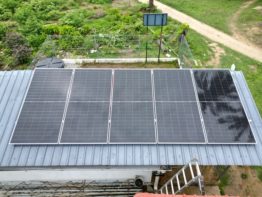 Aerial view of the solar panel array on the pump house roof at Pulau Teluk Renjuna